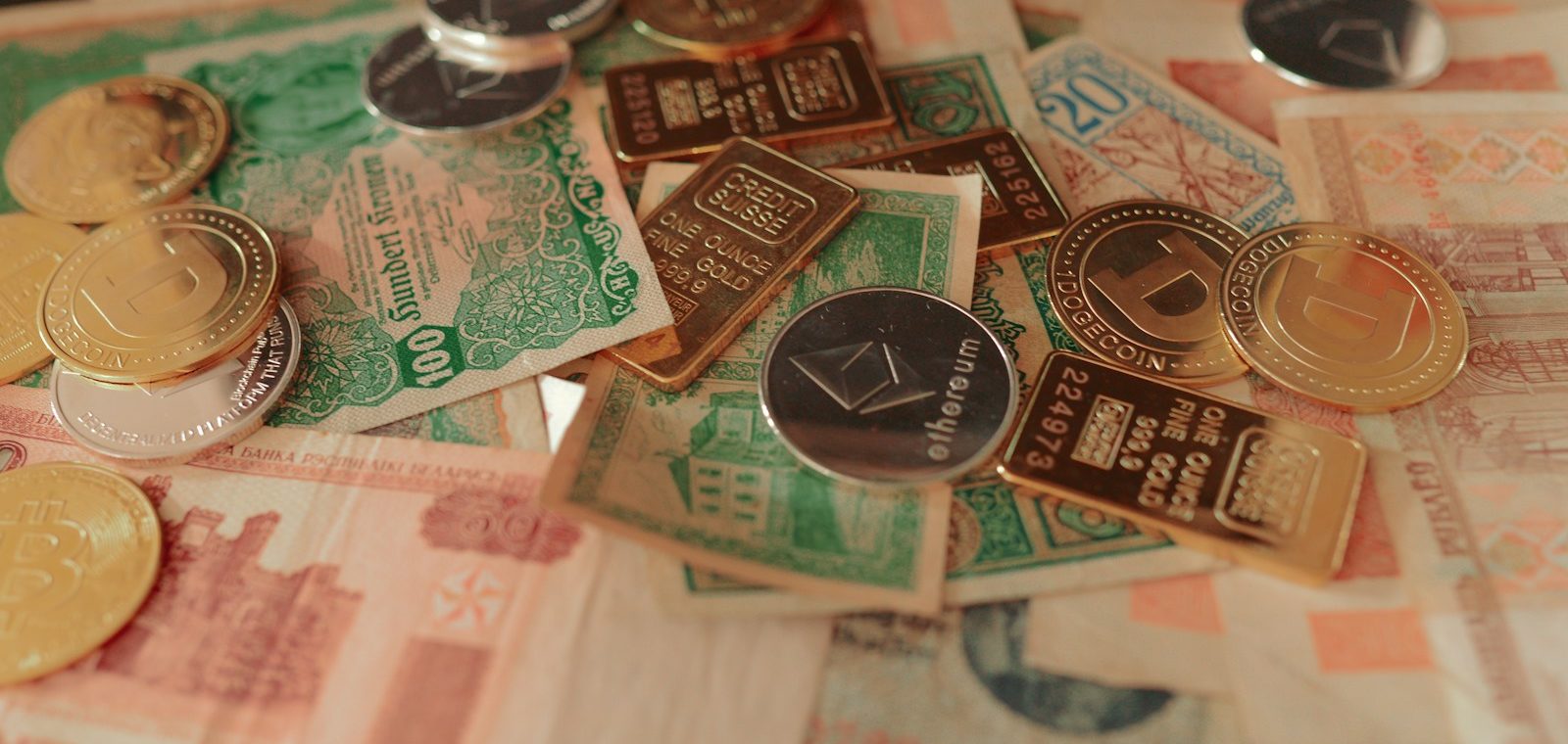 a pile of foreign currency sitting on top of a table