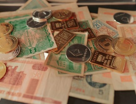 a pile of foreign currency sitting on top of a table